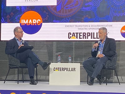 MinterEllison&rsquo;s Andrew Corletto speaks with Bob Fulker (right) at IMARC 2024
